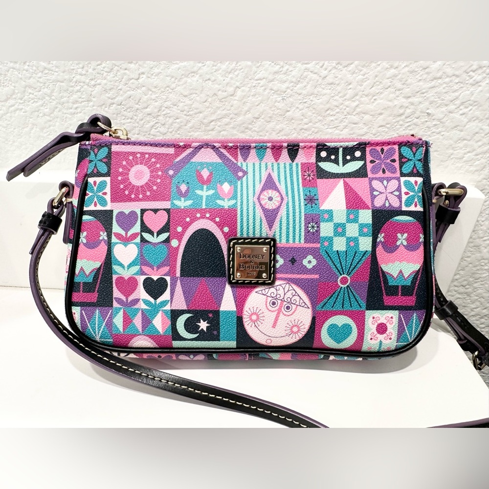 Dooney & Bourke Disney It’s a Small World Pouchette Crossbody Purse Gently Used